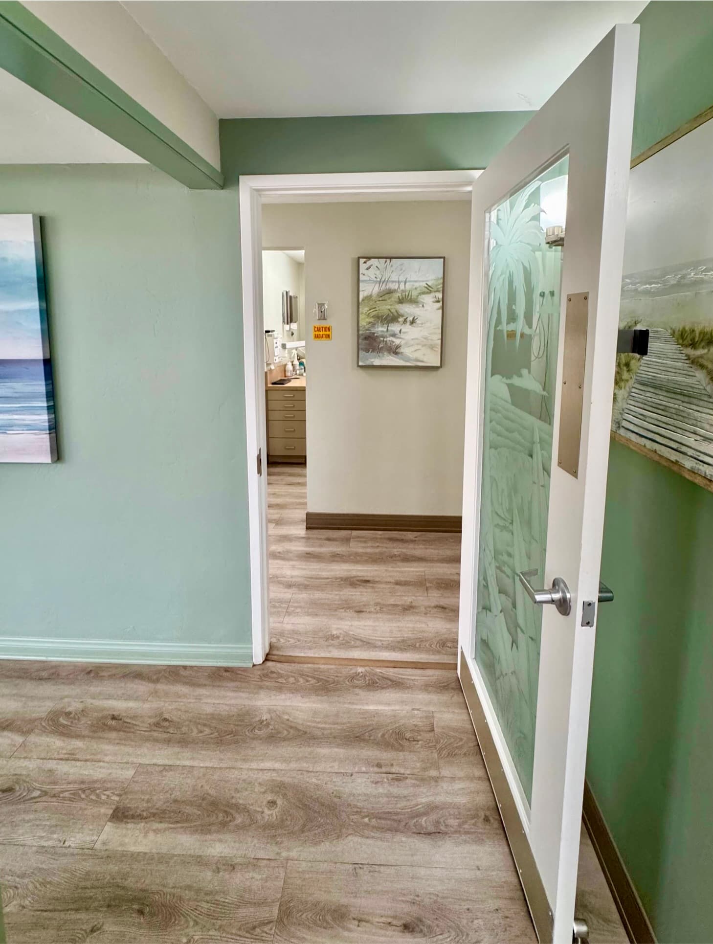 Bright hallway leading to treatment rooms